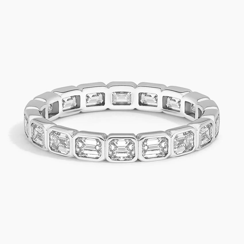 East-West Emerald Bezel Eternity Ring