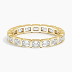 East-West Emerald Bezel Eternity Ring
